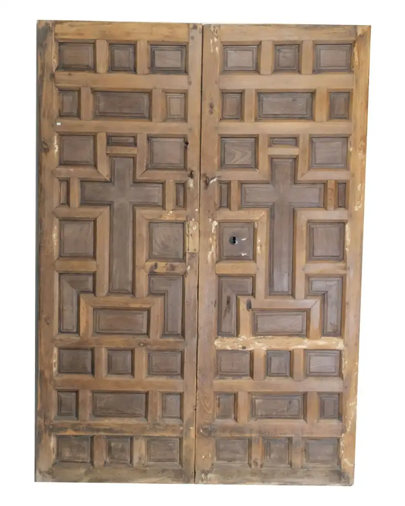 Puerta Castellana, Siglo XVII de Cuarterones con Cruz Central
