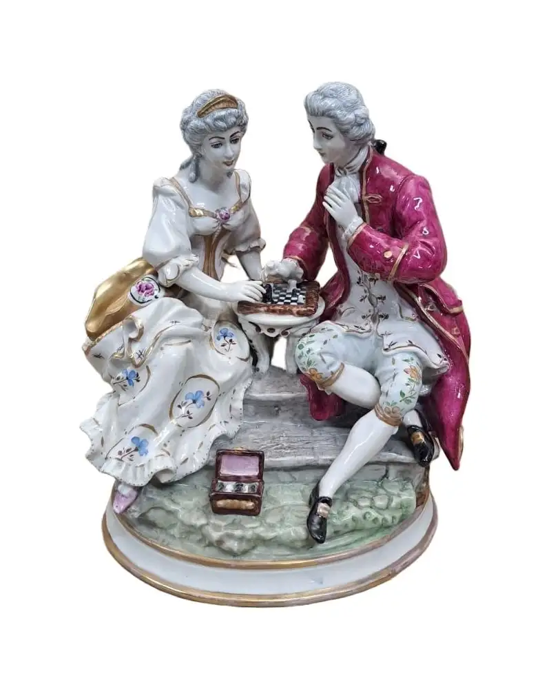 Figuras de porcelana Meissen, jugando al ajedrez, siglo XX