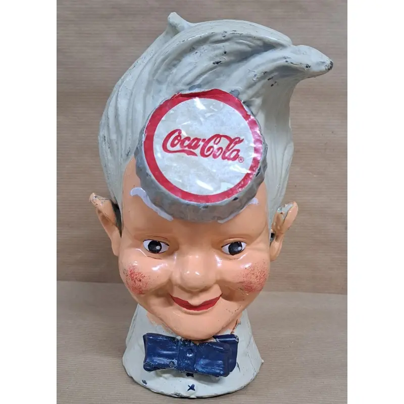Hucha Coca Cola, hierro fundido, Herrería y Metal