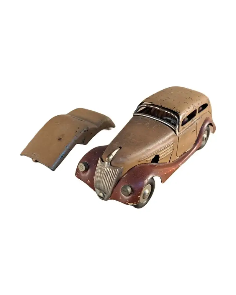 Sedán Construcciones Payá de metal a cuerda. Coche antiguo español, años 40-50