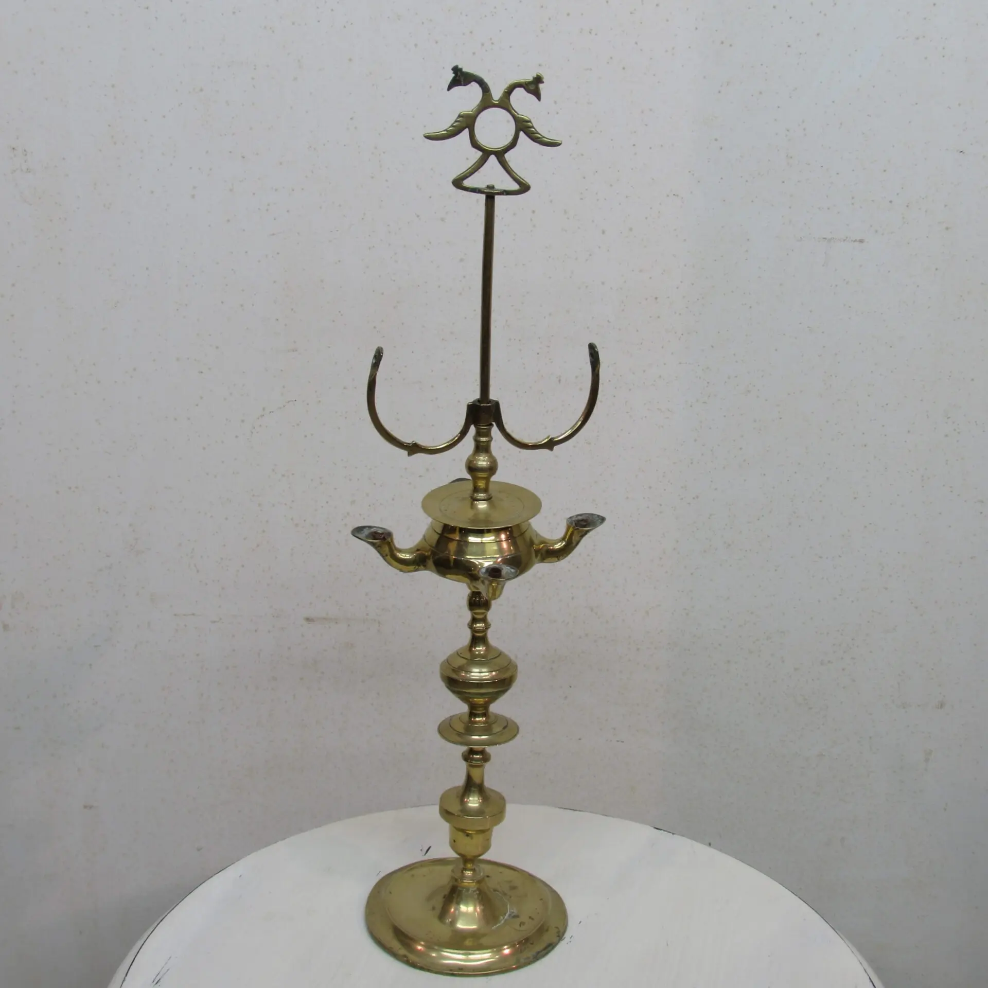 Quinqué antiguo de aceite, Iluminación